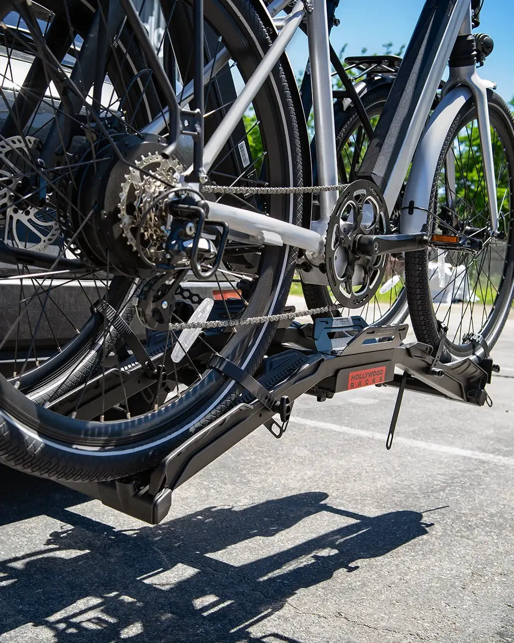 Hollywood Destination E-Bike Rack securely holding e-bikes with wide aluminum ramp, perfect for easy transport on adventures.